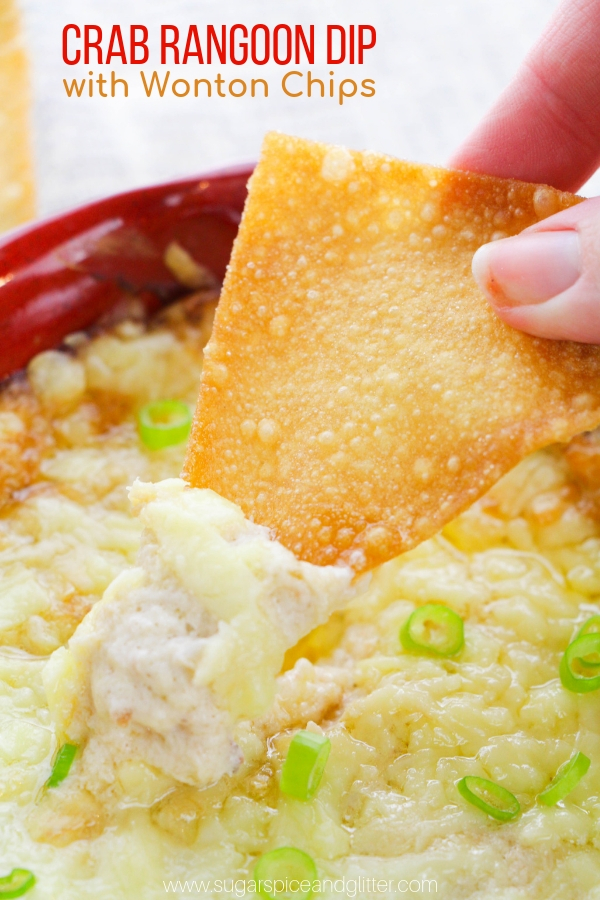 Crab Rangoon Dip with Wonton Chips, the ultimate party dip for real foodies, this cheesy dip recipe has three kinds of cheese, lots of real crab meat, and plenty of Asian flavors happening
