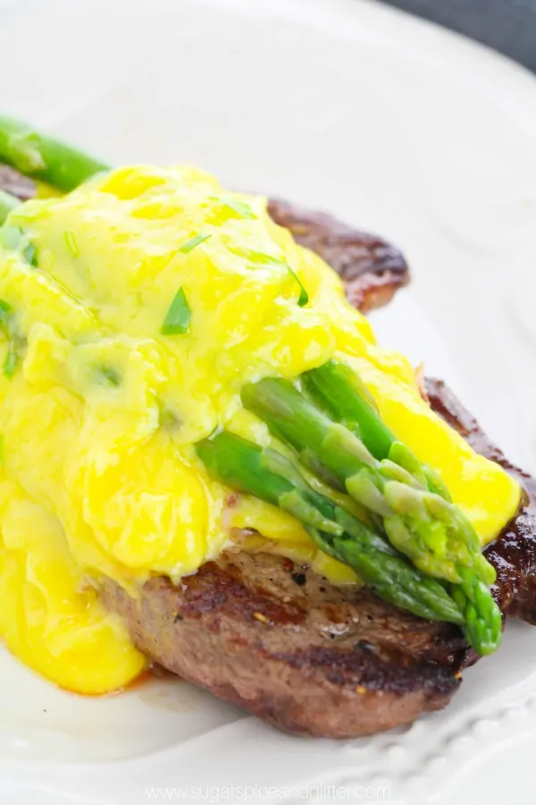 Simply the best surf and turf recipe you will ever eat - let alone make! Steak Oscar combines pan seared steak, crabmeat, asparagus and buttery bearnaise sauce