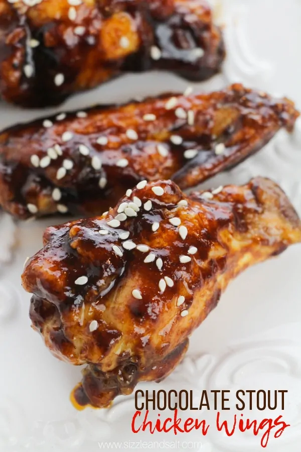 A delicious Guinness chicken wing recipe that has a chocolatey taste thanks to brown sugar, balsamic vinegar and stout. The perfect appetizer for game day, Valentine's Day or St Patrick's Day