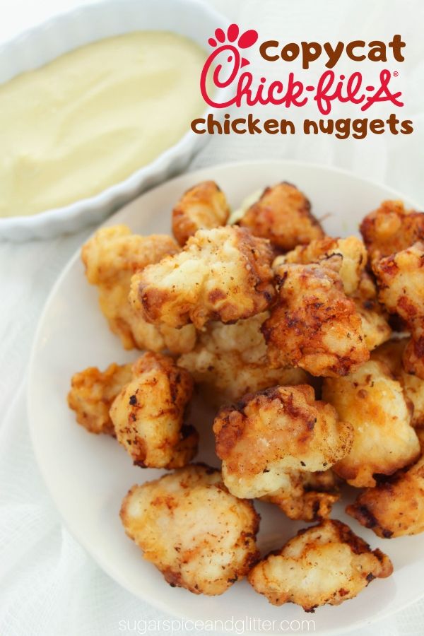 Parents, you need this Copycat Chick-Fil-A Chicken Nugget recipe in your life! Simply the best homemade chicken nugget recipe, with umami, tart, sweet and salty tastes all combined in glorious golden nuggets