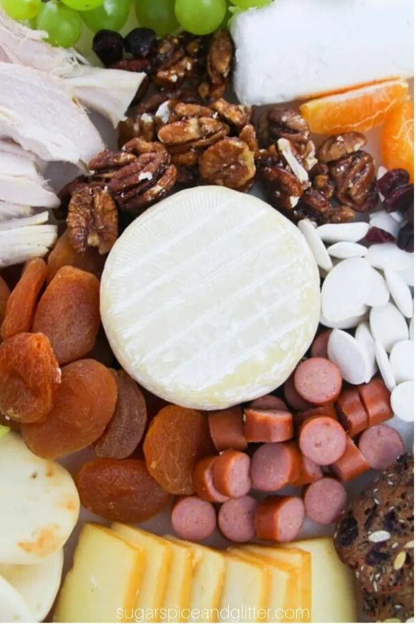 Yum! This Fall Cheeseboard is full of so many goodies, your guests are going to love it
