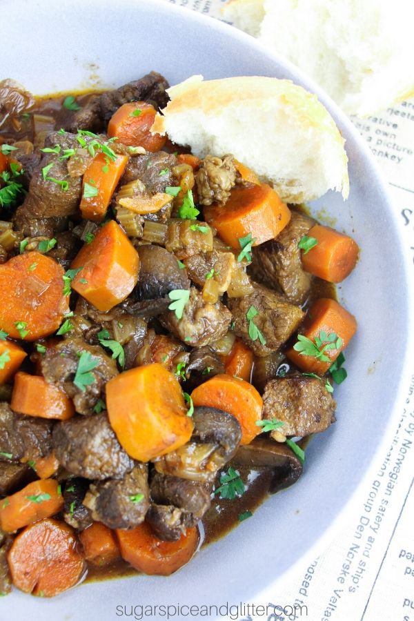 Instant Pot Beef Bourguignon is a mouth-watering beef stew featuring melt-in-your-mouth steak, rich wine gravy and perfectly cooked vegetables. Ready in under an hour