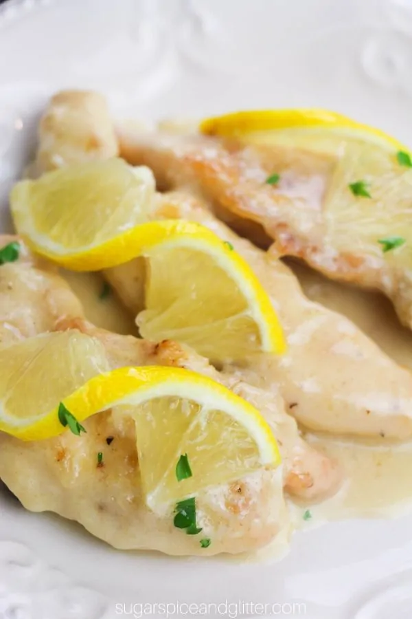 A Instant Pot chicken recipe with a perfect balance of bright lemon, salty capers, and tender chicken smothered in a creamy sauce
