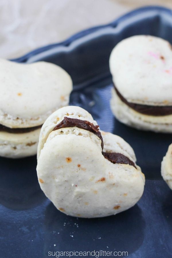 Everything you need to know to make foolproof strawberry macarons with chocolate ganache filling. These macarons are dye-free and artificial-flavoring free