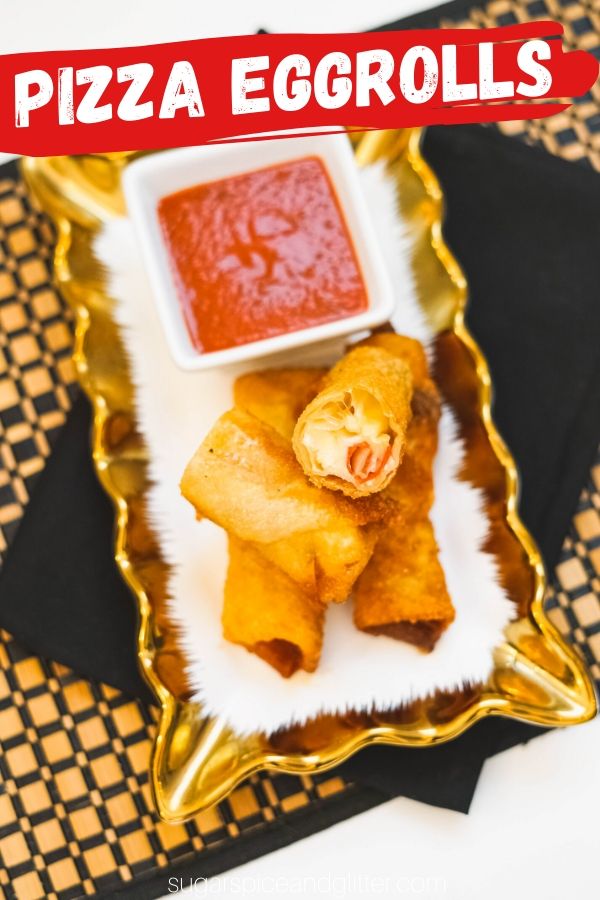 How to make pizza-stuffed egg rolls, a fun mash-up of pizza and egg rolls with a golden crunchy exterior and melted cheesy interior. Serve with dipping sauce to complete the pizza experience