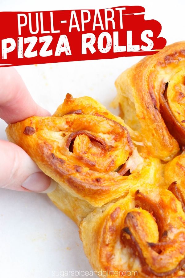 A unique appetizer recipe - these Pull-Apart Pizza Rolls are simple enough that kids can make them, and delicious enough to serve to a crowd! Perfect for parties, tailgating, family night or a lunch box treat