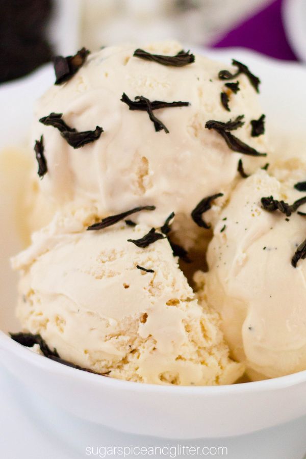 close-up picture of a white bowl of London Fog ice cream with tea leaves scattered on top
