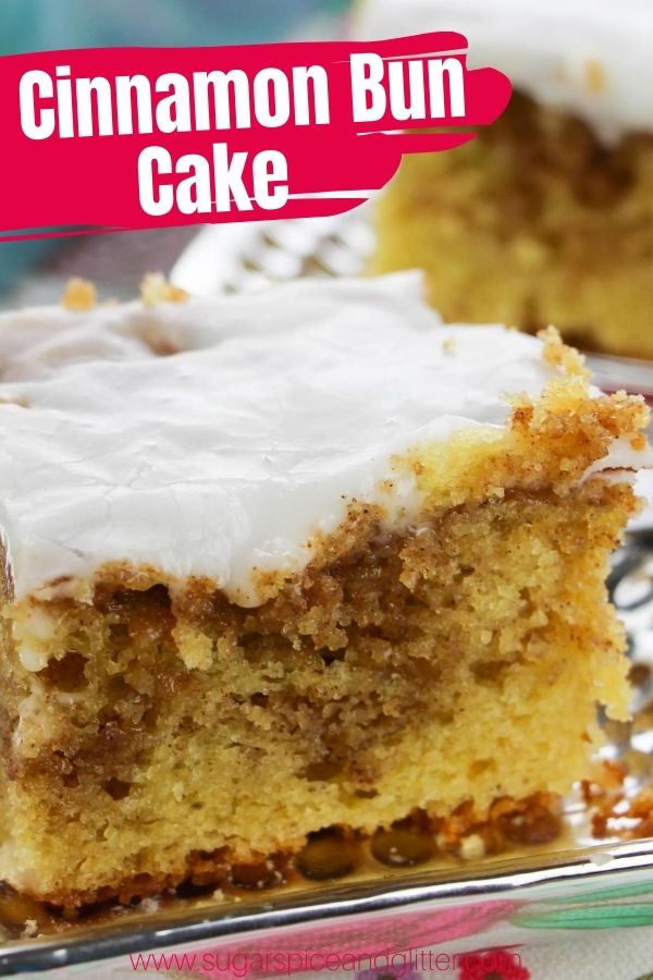 A scrumptious and tender cinnamon bun cake with swirls of sweet cinnamon sugar, crackly vanilla frosting glaze and all of the flavor of a traditional cinnamon bun - without all the work! This easy sheet cake is the perfect potluck dessert