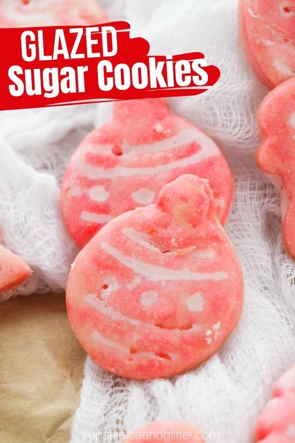 Crunchy, melt-in-your-mouth sugar cookies with a super simple sugar cookie glaze - these cute little sugar cookies look like they were purchased at a gourmet bakery but are deceptively simple to make.