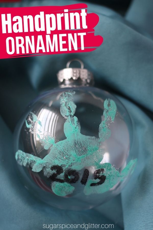 A sweet Christmas handprint ornament is the perfect way to preserve their little handprints and makes a great grandparent gift. These simple handprint ornaments just take a few minutes to make and will be cherished for years to come!
