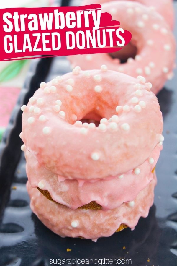 A super simple baked cake donut recipe topped with a from-scratch homemade strawberry glaze. These strawberry glazed donuts will rival anything you can find in a donut shop!