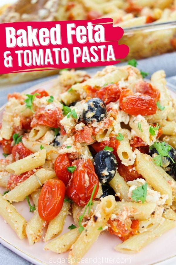 A delicious Greek-inspired pasta recipe featuring baked feta, tomatoes and olives. The baked feta and veggies turns into a creamy sauce that coats the pasta for a delicious and super simple meal the whole family will love.