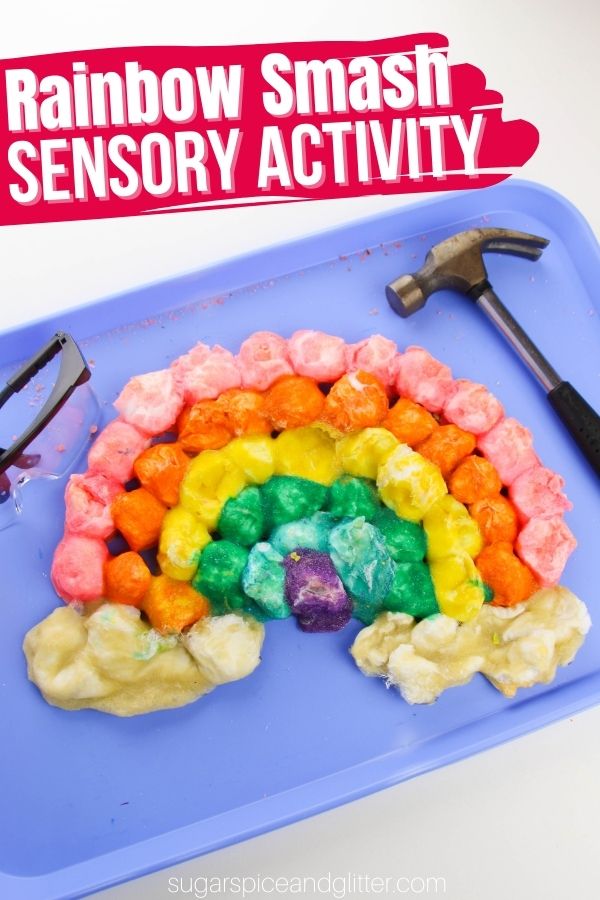 A fun rainbow sensory activity for kids, this Rainbow SMASH activity allows kids to use real tools to smash a baked cotton ball rainbow. A crunchy, satisfying sensory activity made with everyday household materials.
