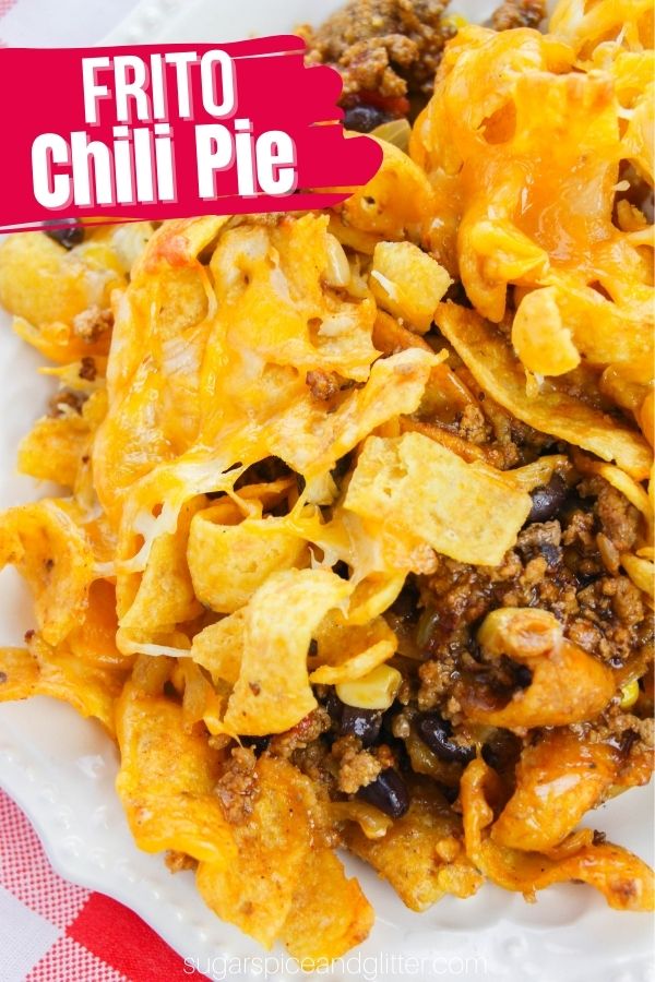 A quick and easy recipe for a Frito Pie Casserole, a family-sized take on the classic Frito Pie Walking Tacos. This hearty, cheesy, crunchy and satisfying meal is a family favorite!