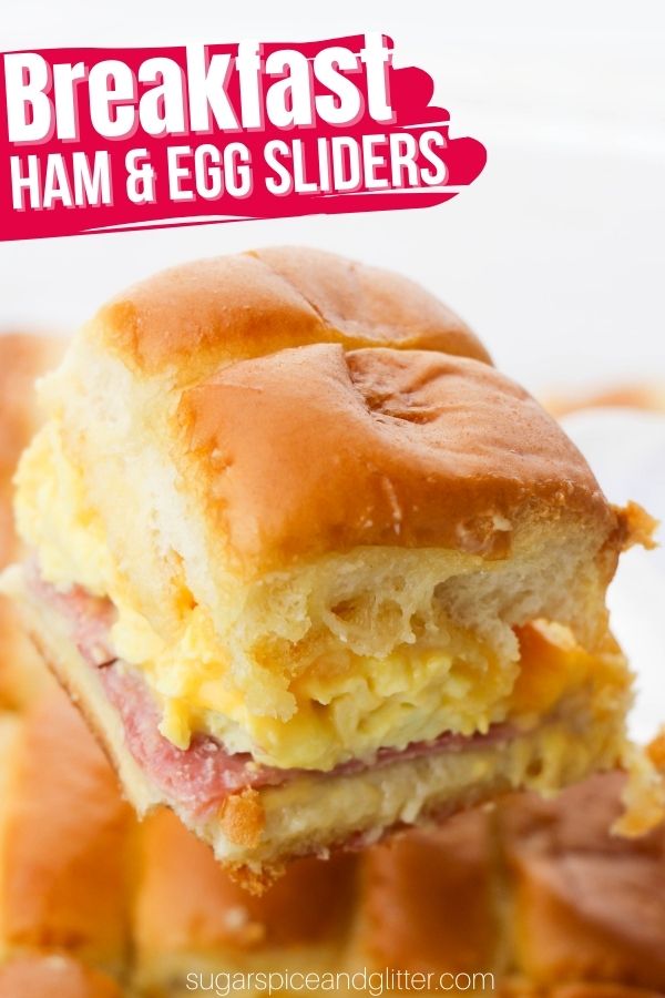 How to make ham egg and cheese breakfast sliders - a delicious grab-and-go weekday breakfast or a decadent brunch treat. These buttery breakfast sliders are a delicious and easy breakfast the whole family will love.