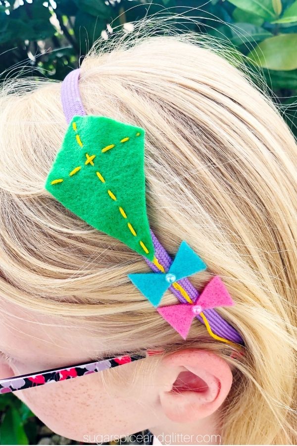 Close-up picture of a kite headband on a little girl's head