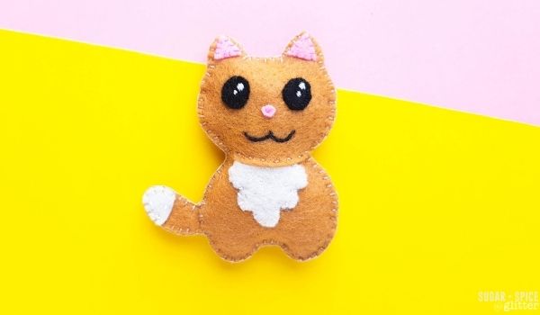 Cat stuffie on a pink background