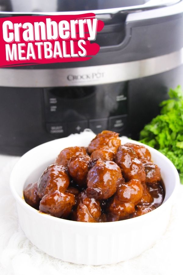 Perfectly cooked meatballs coated in a tangy, sweet and smoky sauce, this 3-ingredient crockpot appetizer recipe is a festive twist on crockpot party meatballs.