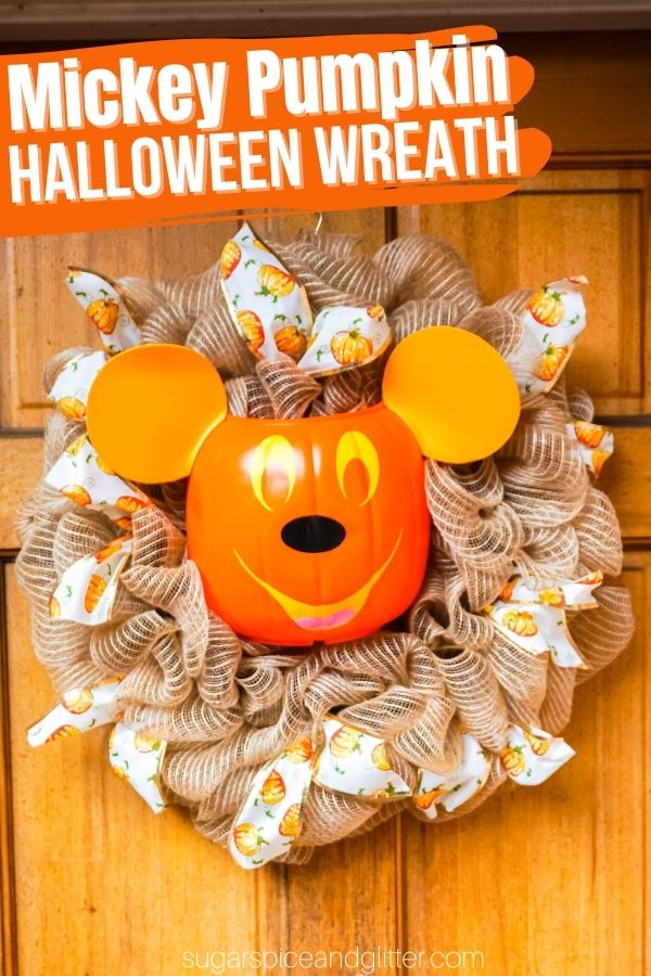 A fun DIY Mickey Pumpkin Wreath to bring a bit of the magic of the parks home with you! This super simple Cricut Wreath uses our free Mickey Pumpkin SVG to transform a plain pumpkin bucket into Mickey's expressive face. Swap out the burlap with fall florals or leaf garlands, if desired.