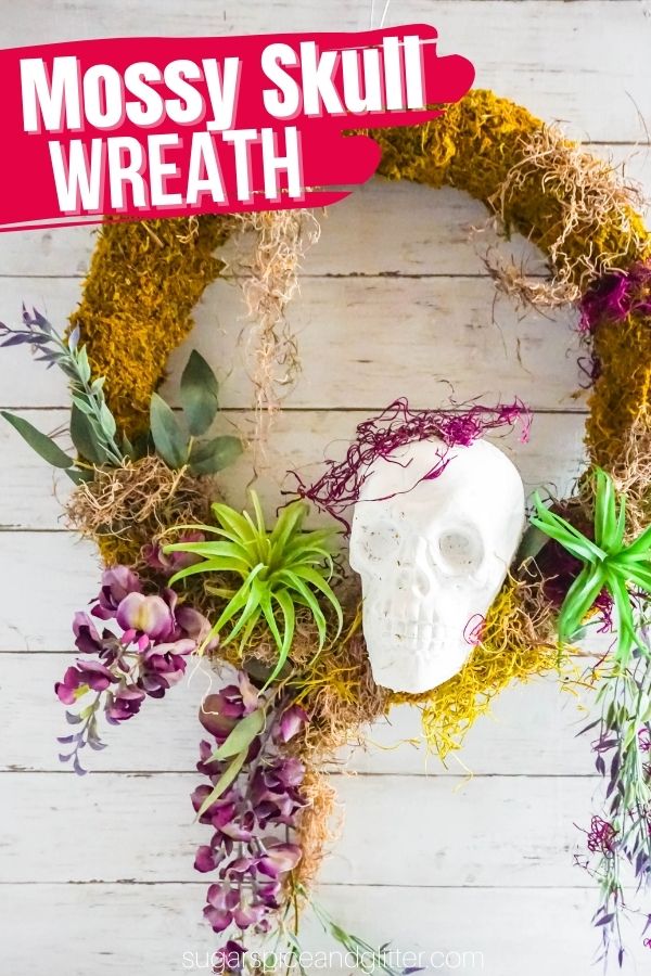 A not-too-spooky mossy skull wreath that brings an earthy touch to your front door. This natural-looking wreath is a neutral alternative to the brightly colored Halloween wreaths and decor that tend to dominate the season.