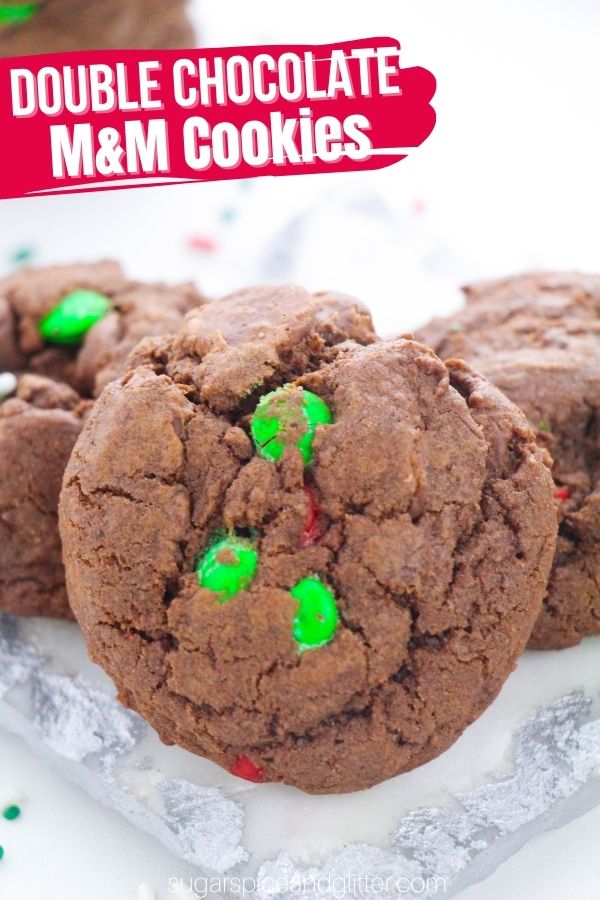 A decadent, rich and super chocolatey M&M Christmas Cookie recipe the kids can help make. This cookie dough freezes beautifully so you can enjoy these scrumptious cookies all season long.