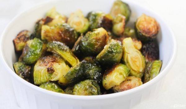 roasted Brussels sprouts in a white bowl