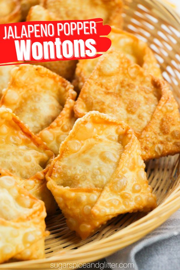 How to make Jalapeno Popper Wontons, the perfect appetizer for game night or a special movie night. These crispy wontons are filled with a flavorful cream cheese filling packed with jalapenos, bacon, cheese and seasonings - and you can make them as mild or as spicy as you like. Post includes instructions for baking, frying or airfrying.