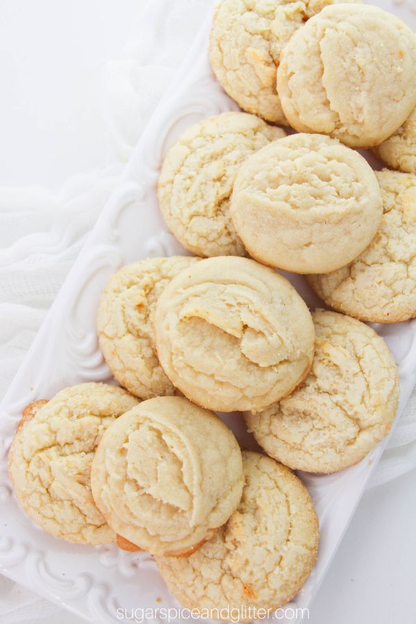 overhead image of amish sugar cookies on a white platter