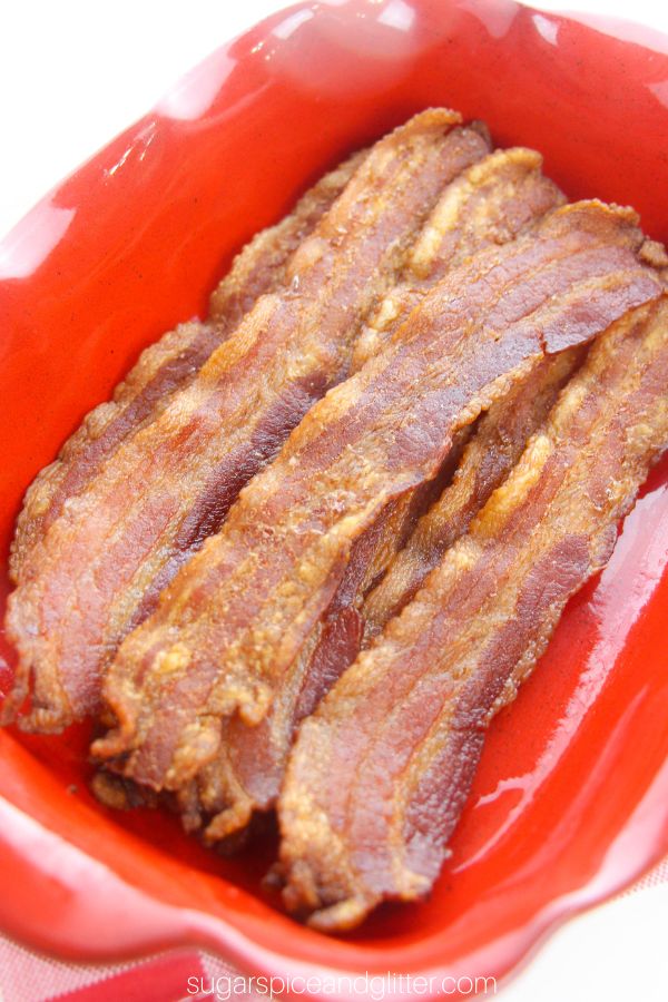 baked bacon in a red casserole dish