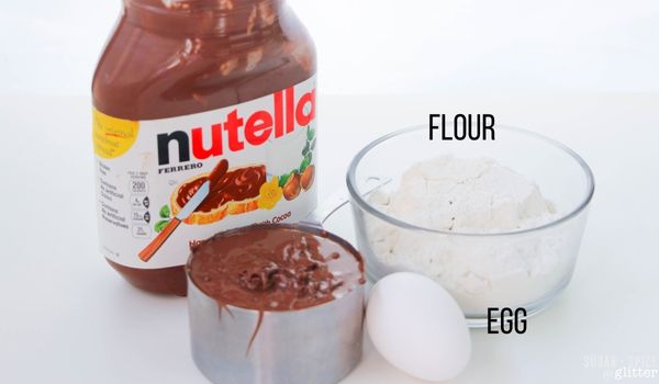 labeled ingredient image showing ingredients needed to make nutella cookies