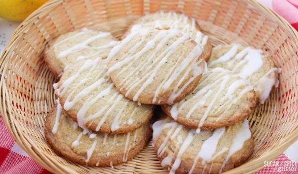 lemon poppyseed cookies set on a wicker tray on a red plaid napkin