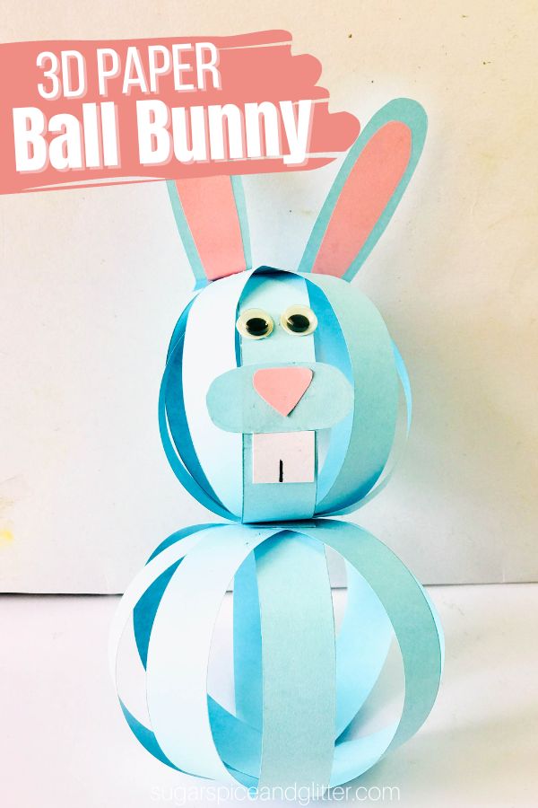 How to make a 3D Paper Ball Bunny with just craft paper, glue and googly eyes. This fun Easter craft is easy for kids to make and can be hung up like a paper lantern or just propped on the shelf for a cute homemade Easter decor piece the kids can be proud of