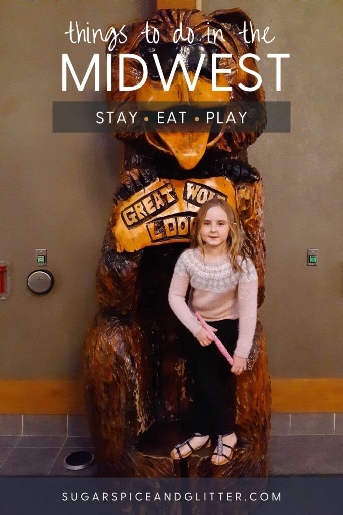 Girl with MagiQuest wand at Great Wolf Lodge, one of the best things to do in the Midwest